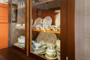 In the sideboard, a porcelain dinner service awaits guests, purchased by Chekhov at the famous Muir & Mirrielees store on Petrovka in Moscow