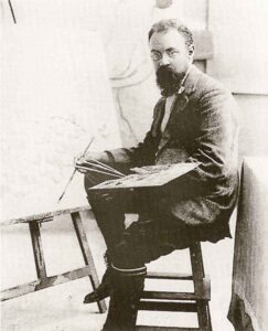 Henri Matisse dans son atelier d'Issy-les-Moulineaux devant le panneau La Danse. 1909